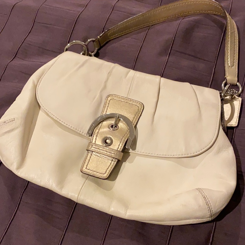 Cream coach purse